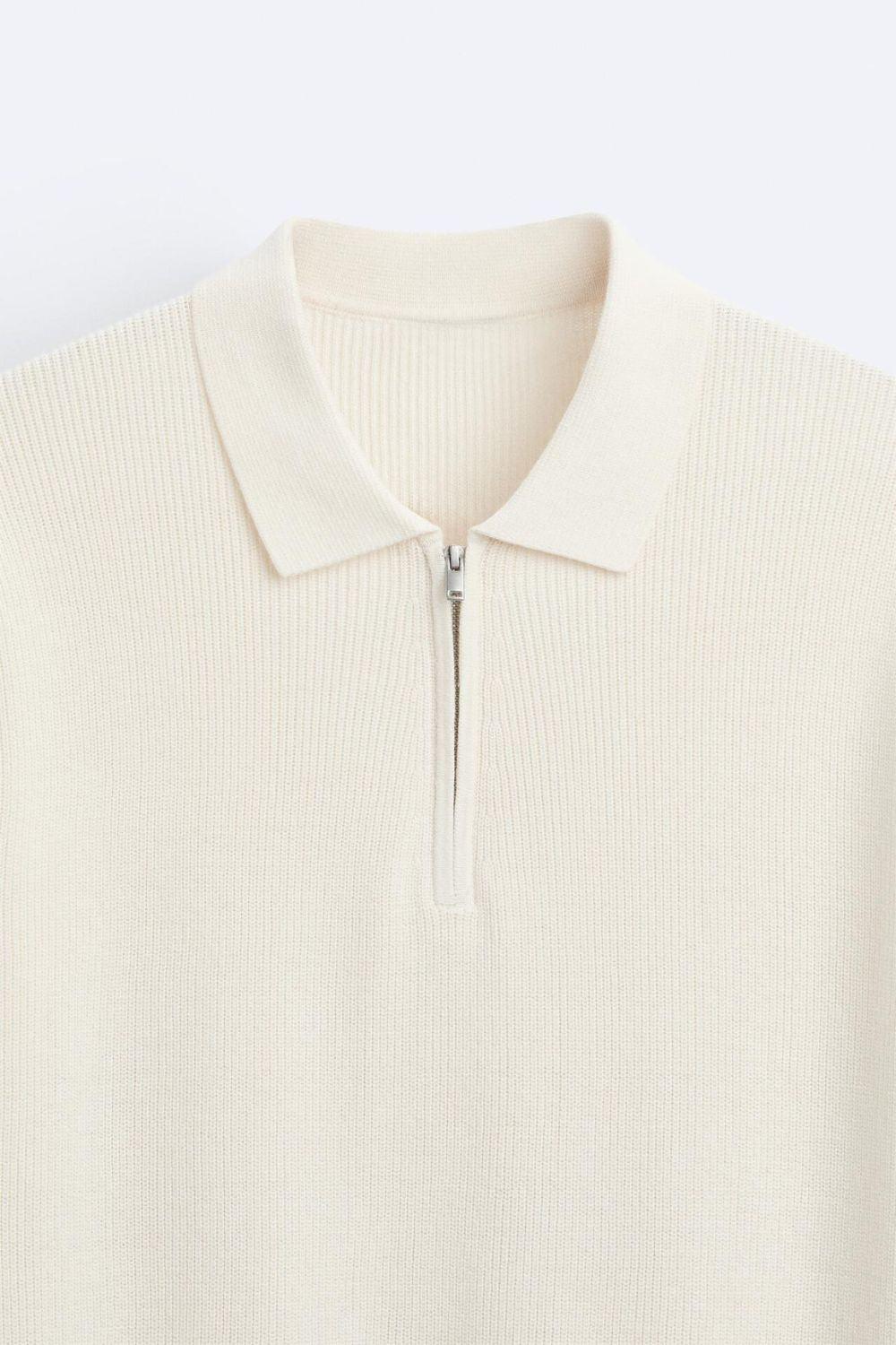 Elegante polo de punto con cremallera