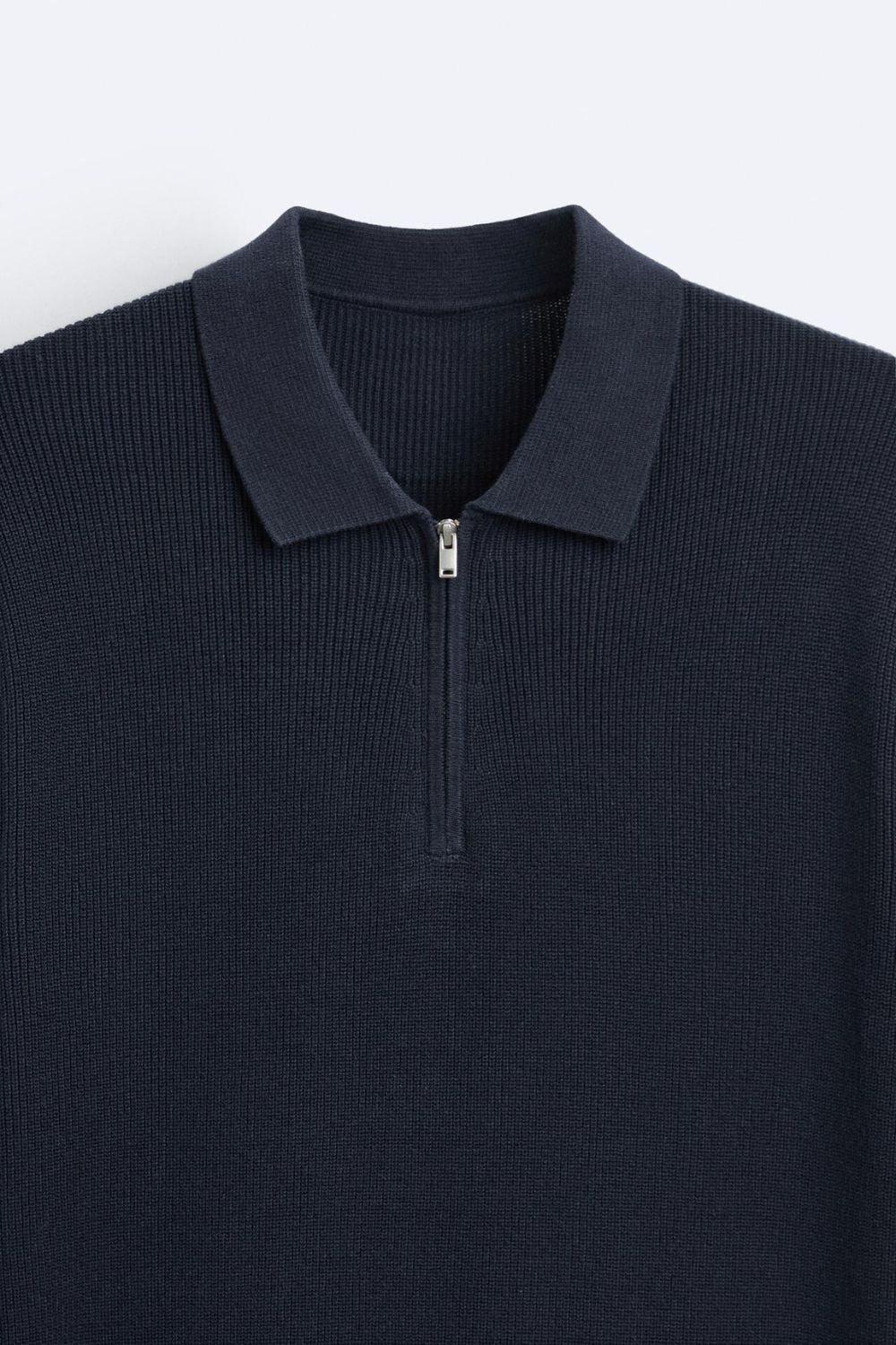 Elegante polo de punto con cremallera