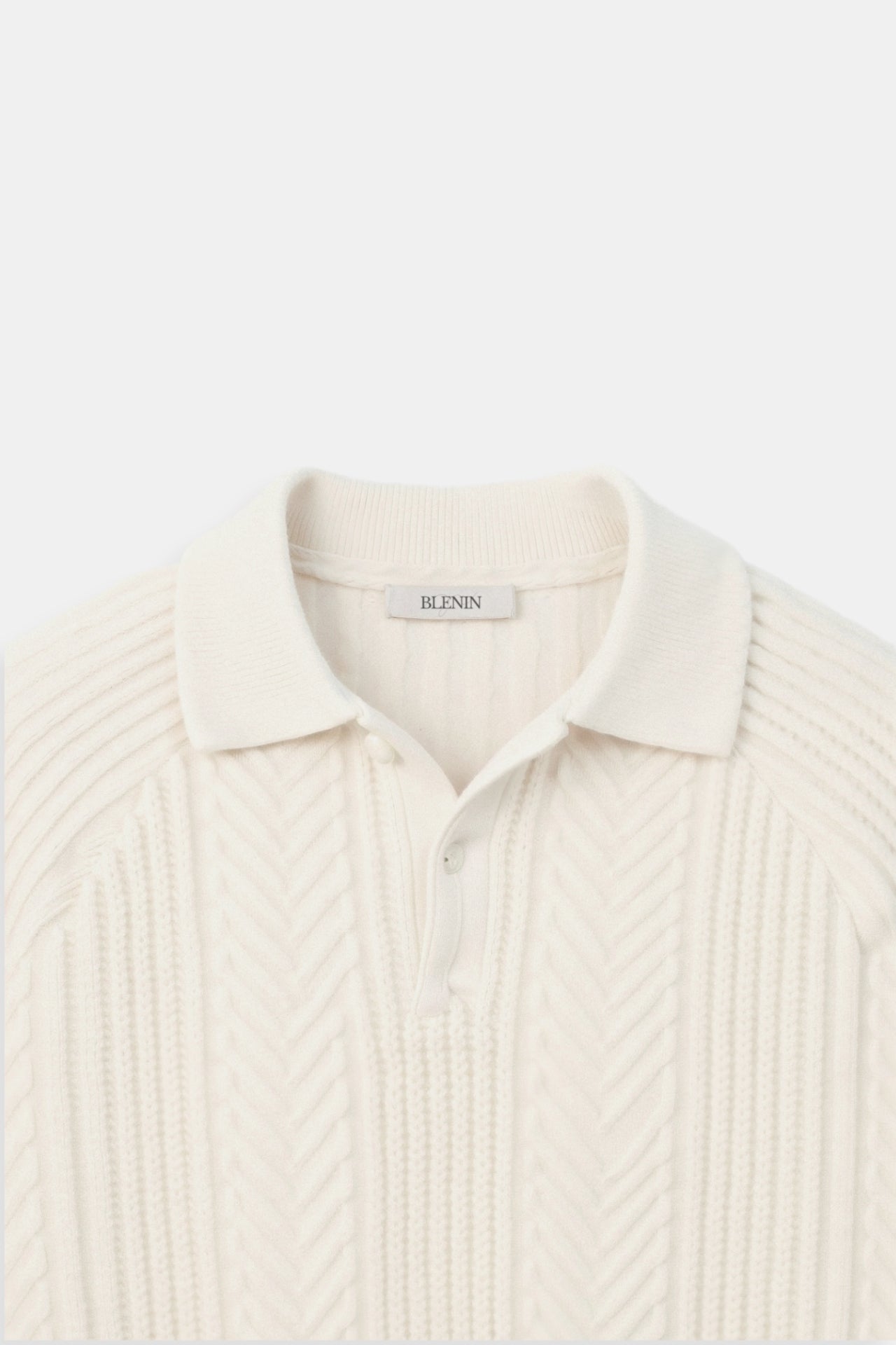 Suéter de punto clásico con cuello polo