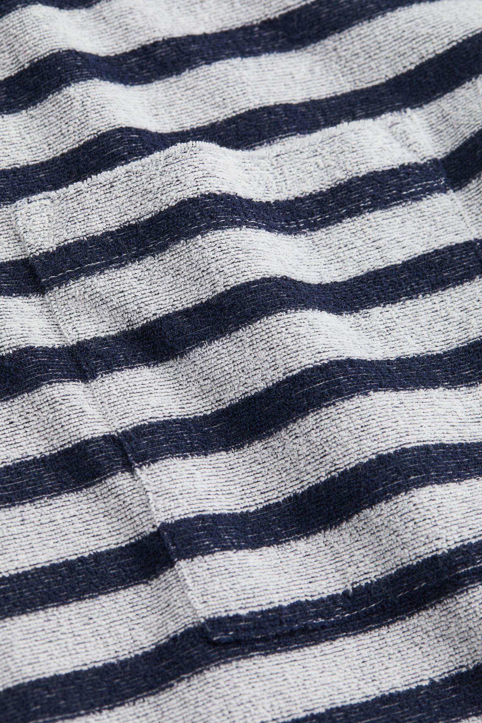 Camisa Polo de Punto a Rayas | Elegancia Marítima con un Toque Moderno