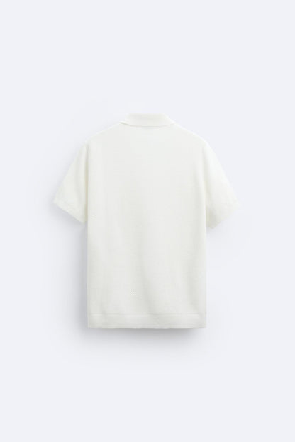 Polo de punto clásico en blanco