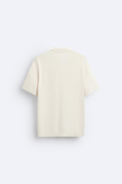 Elegante polo de punto con cremallera