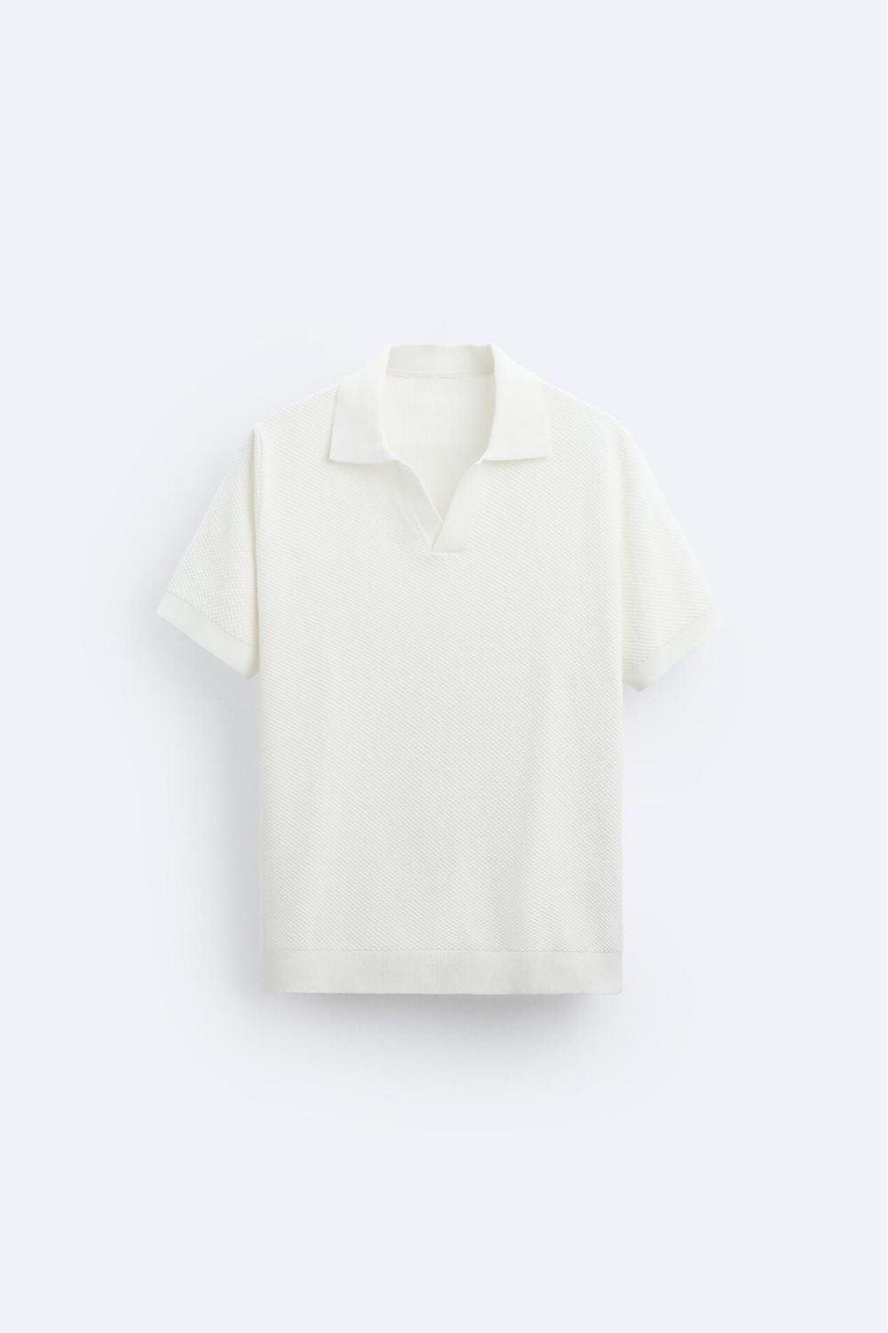 Polo de punto clásico en blanco