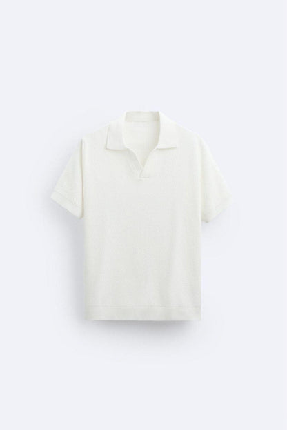Polo de punto clásico en blanco