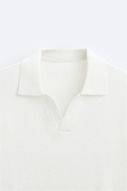 Polo de punto clásico en blanco