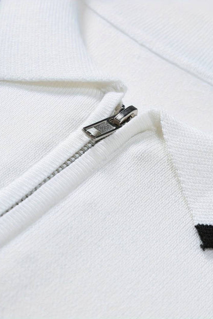 Camisa polo clásica con cremallera y detalles en contraste